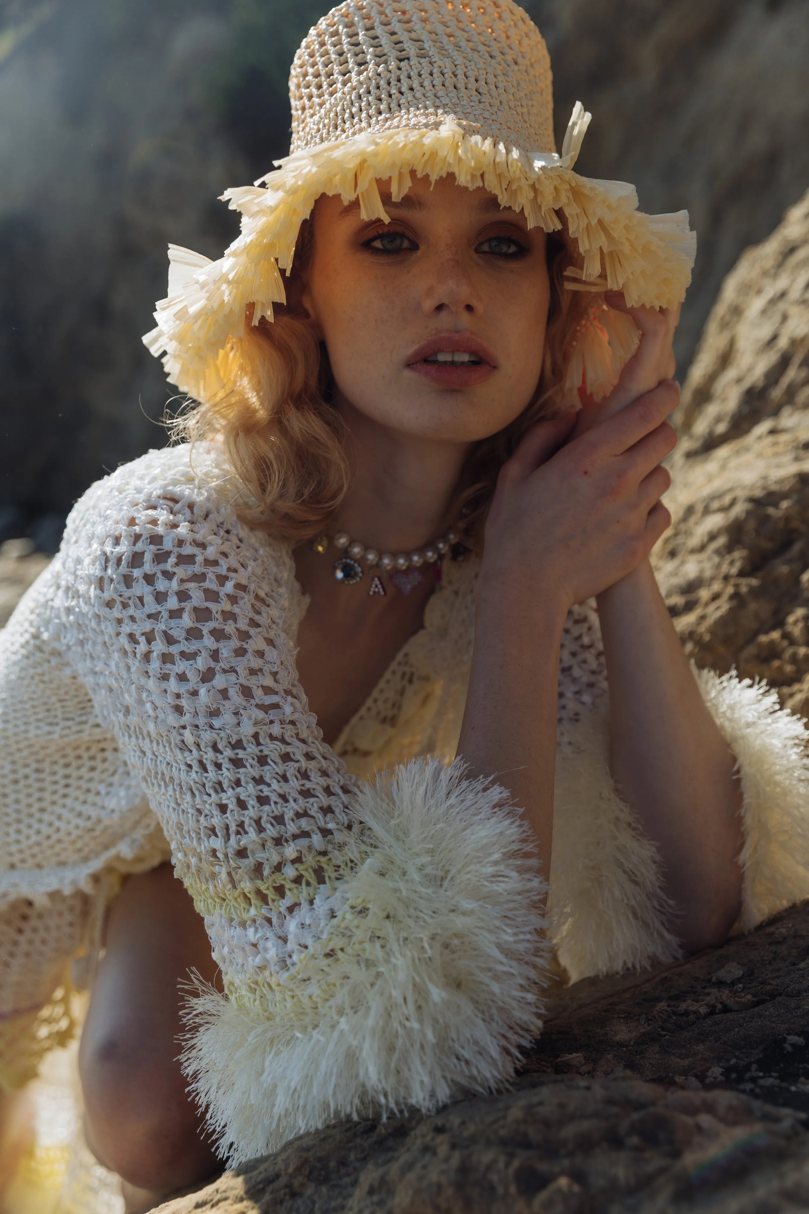 Beige raffia beret hat by Aliya Zhamantayeva