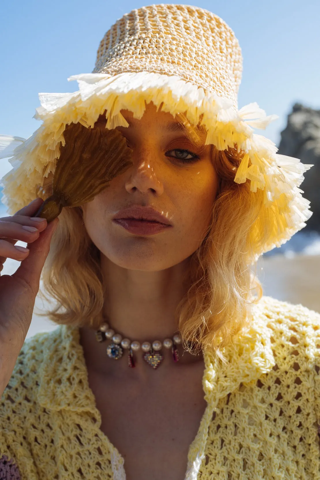 Beige raffia beret hat by Aliya Zhamantayeva